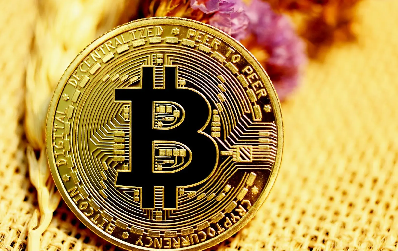 An image of a golden Bitcoin.