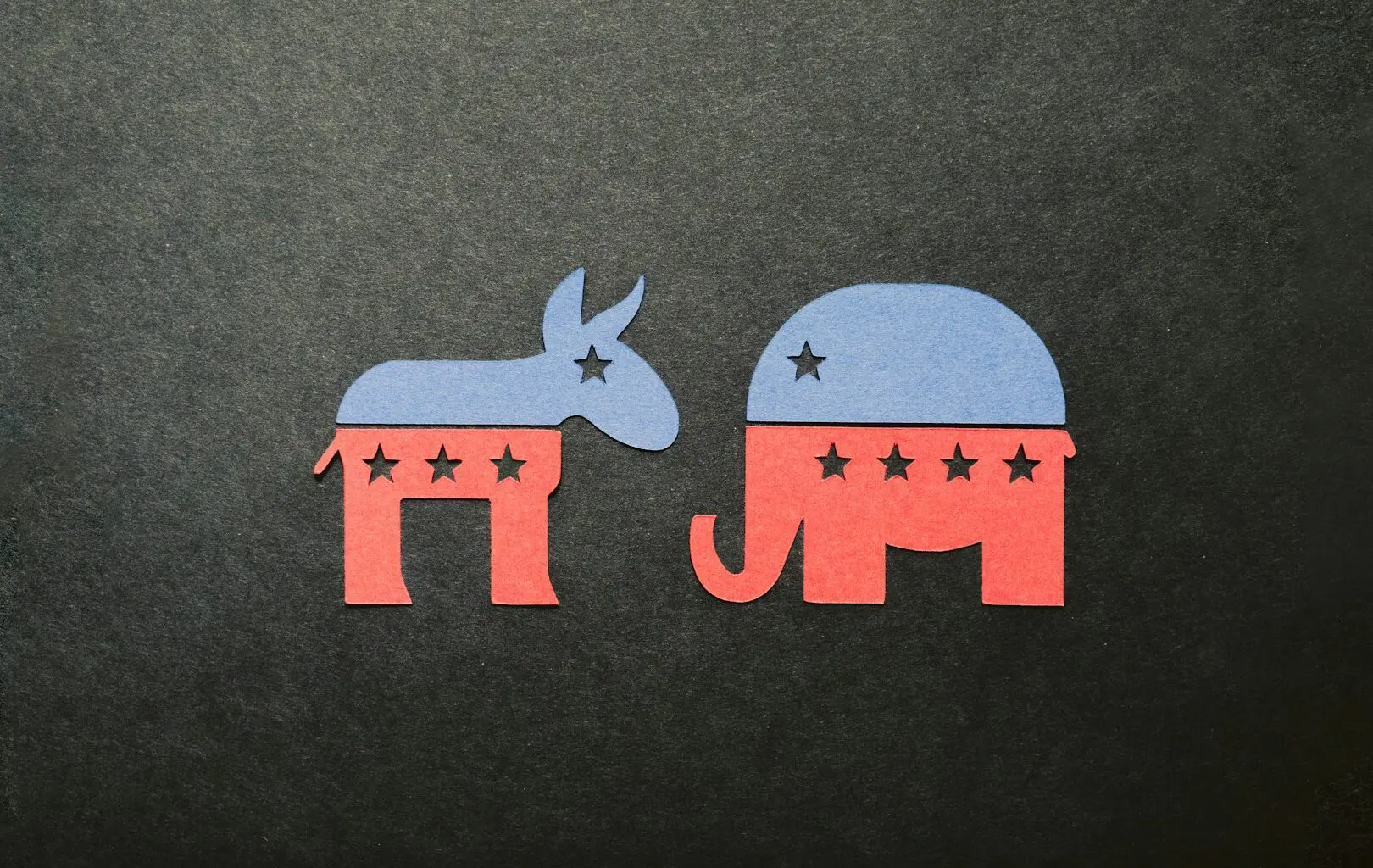 A picture of an elephant and a donkey, symbolising the United States parties in terms of voting.