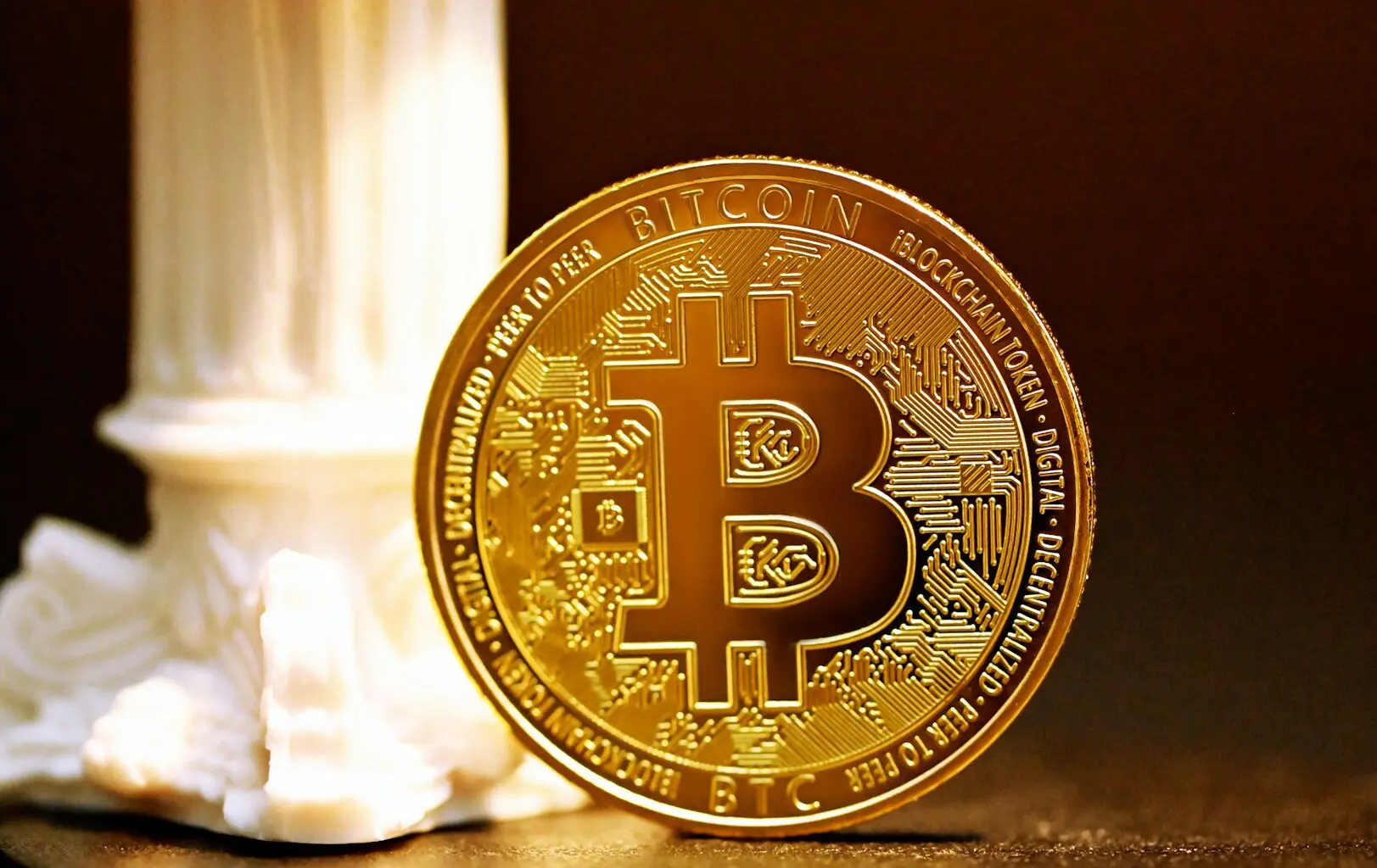 An image of a physical "Bitcoin", representing the crypto coin.