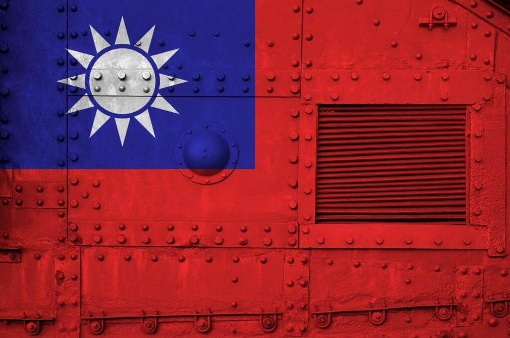Taiwan flag depicted on side part of military armored tank close up