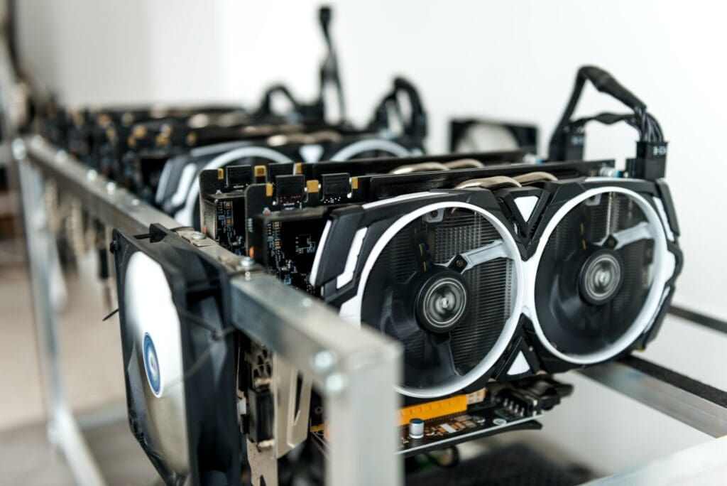 A row of graphics cards set up for cryptocurrency mining.